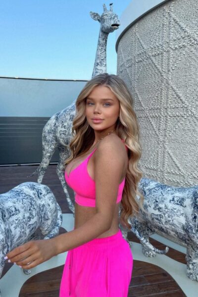 Indian model in pink saree showing off her body.This hot model is ready to fulfill your fantasies” - “Our pink saree collection is perfect for those who want to feel sexy and confident.”